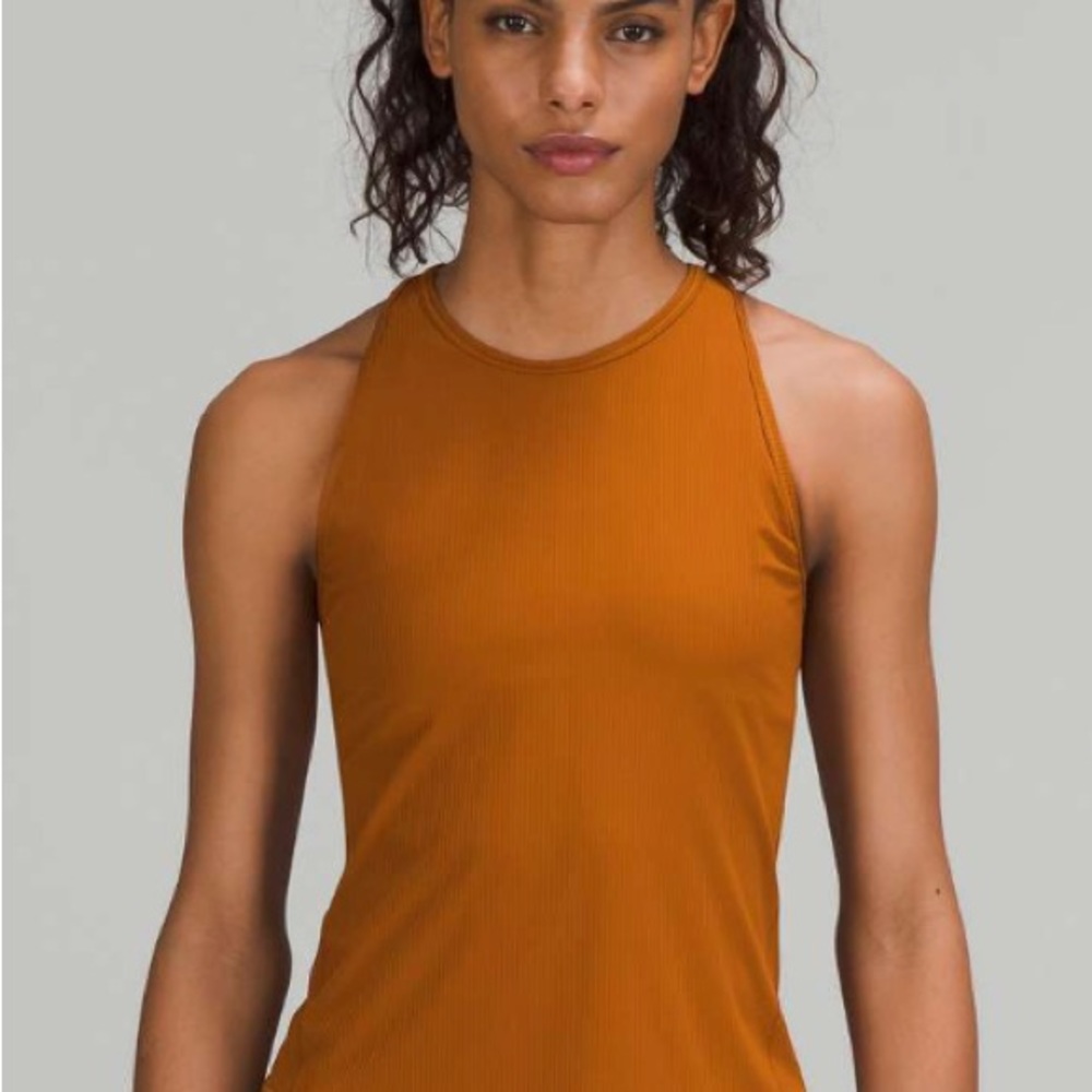 Lululemon base pace ribbed tank top, worn twice! Size 6, butternut brown.